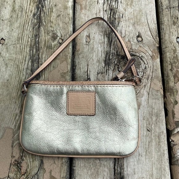 Coach Handbags - Coach Gold Wristlet Used